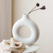 Sleek Circular Ceramic Vase